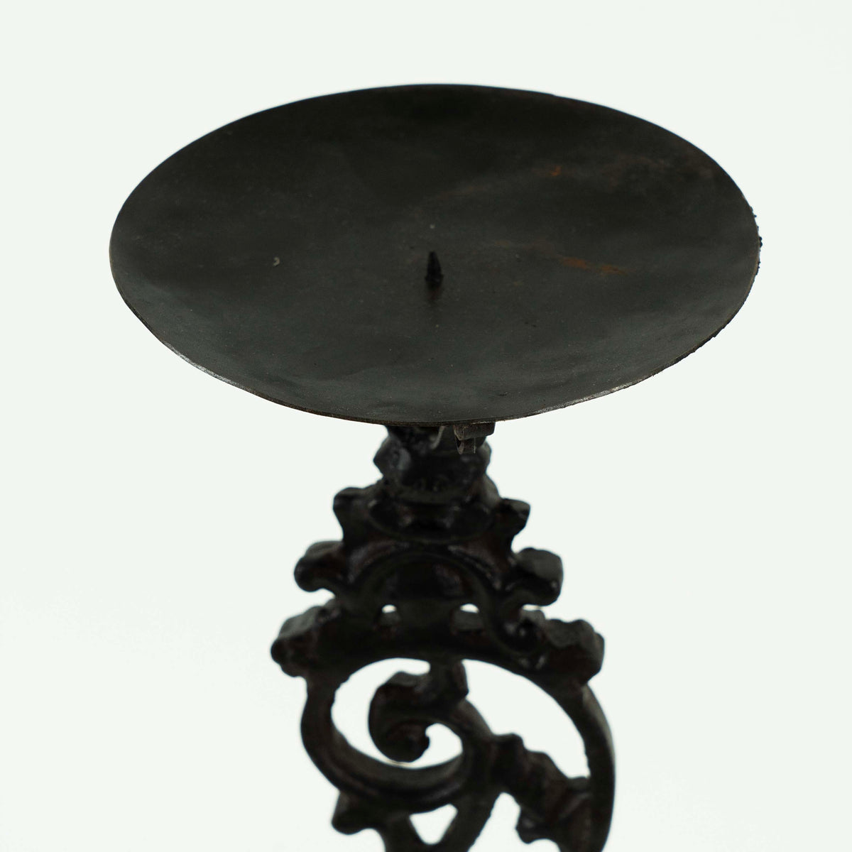 Cast iron candle holder
