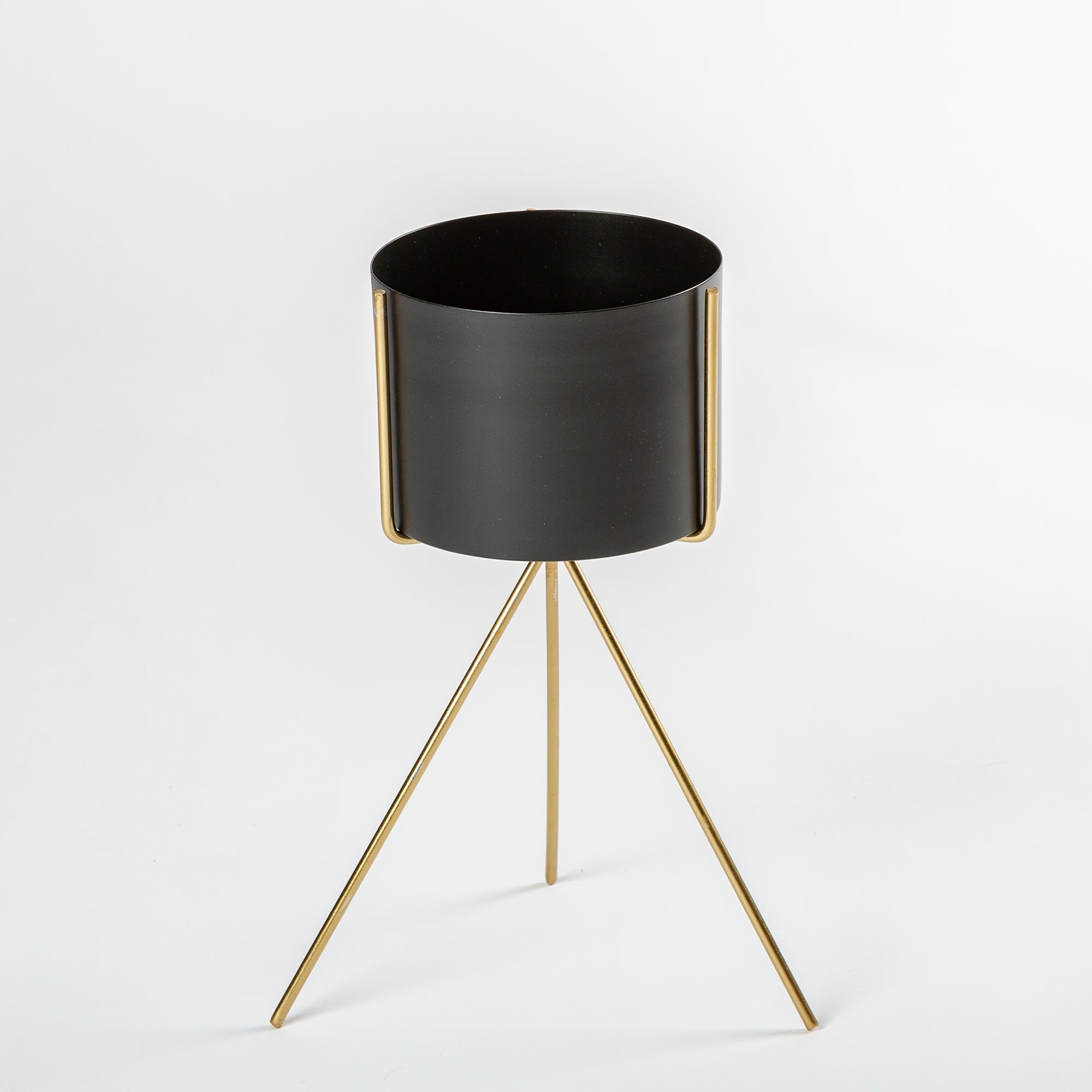 Black planter with golden stand