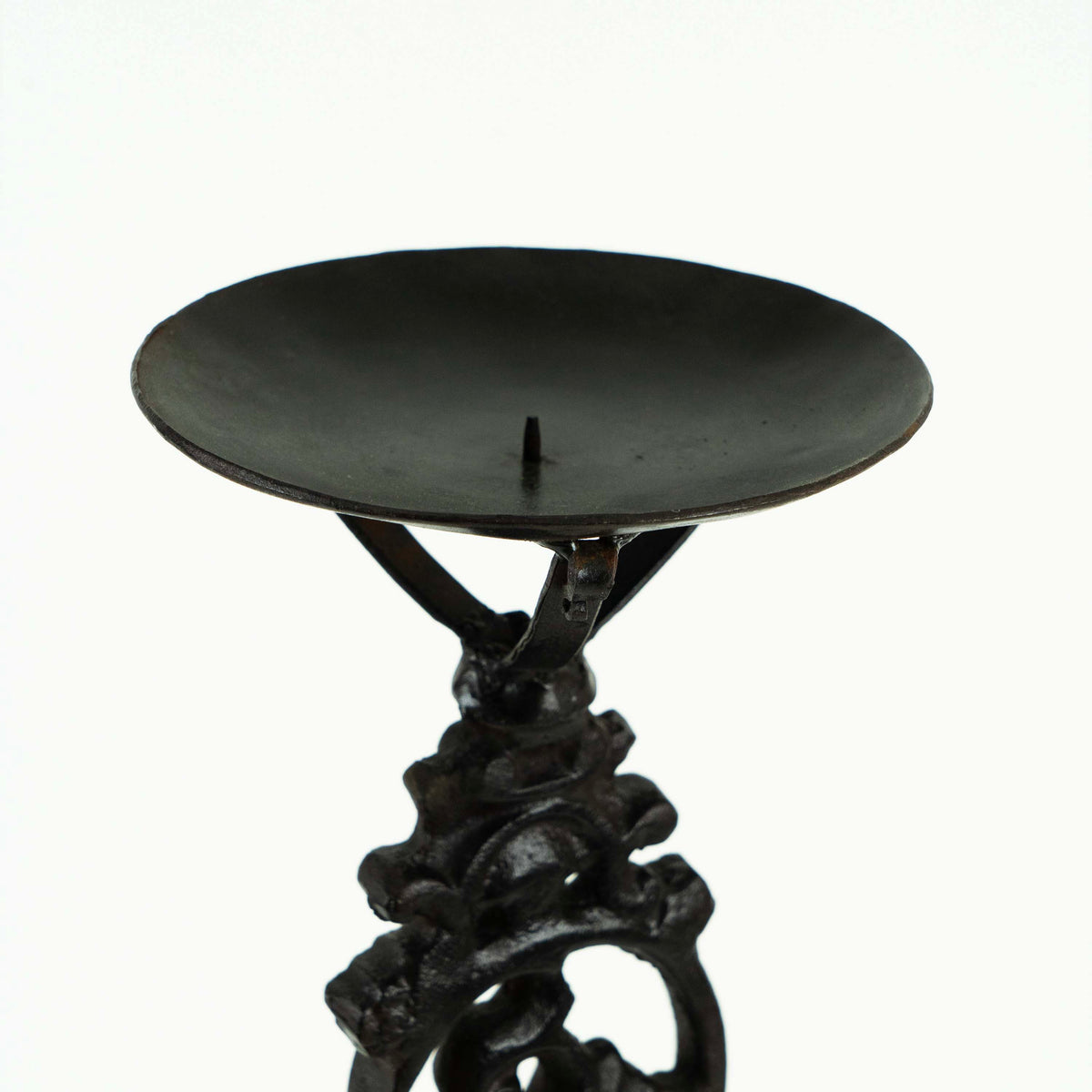 Cast iron candle holder