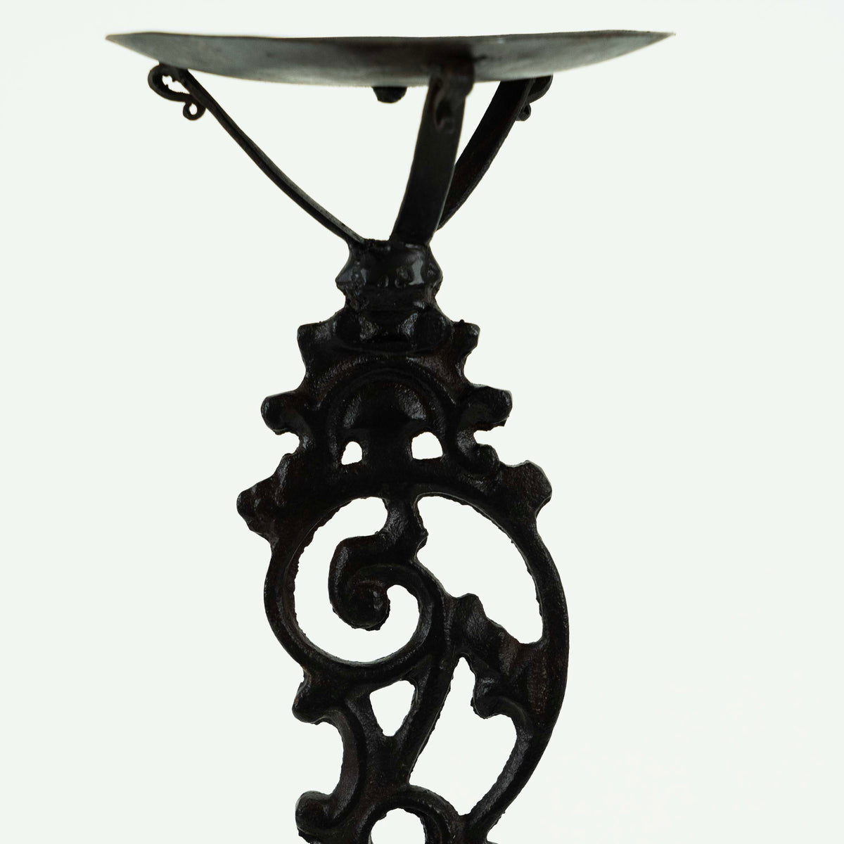 Cast iron candle holder