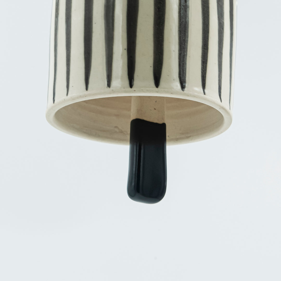 Striped ceramic bell