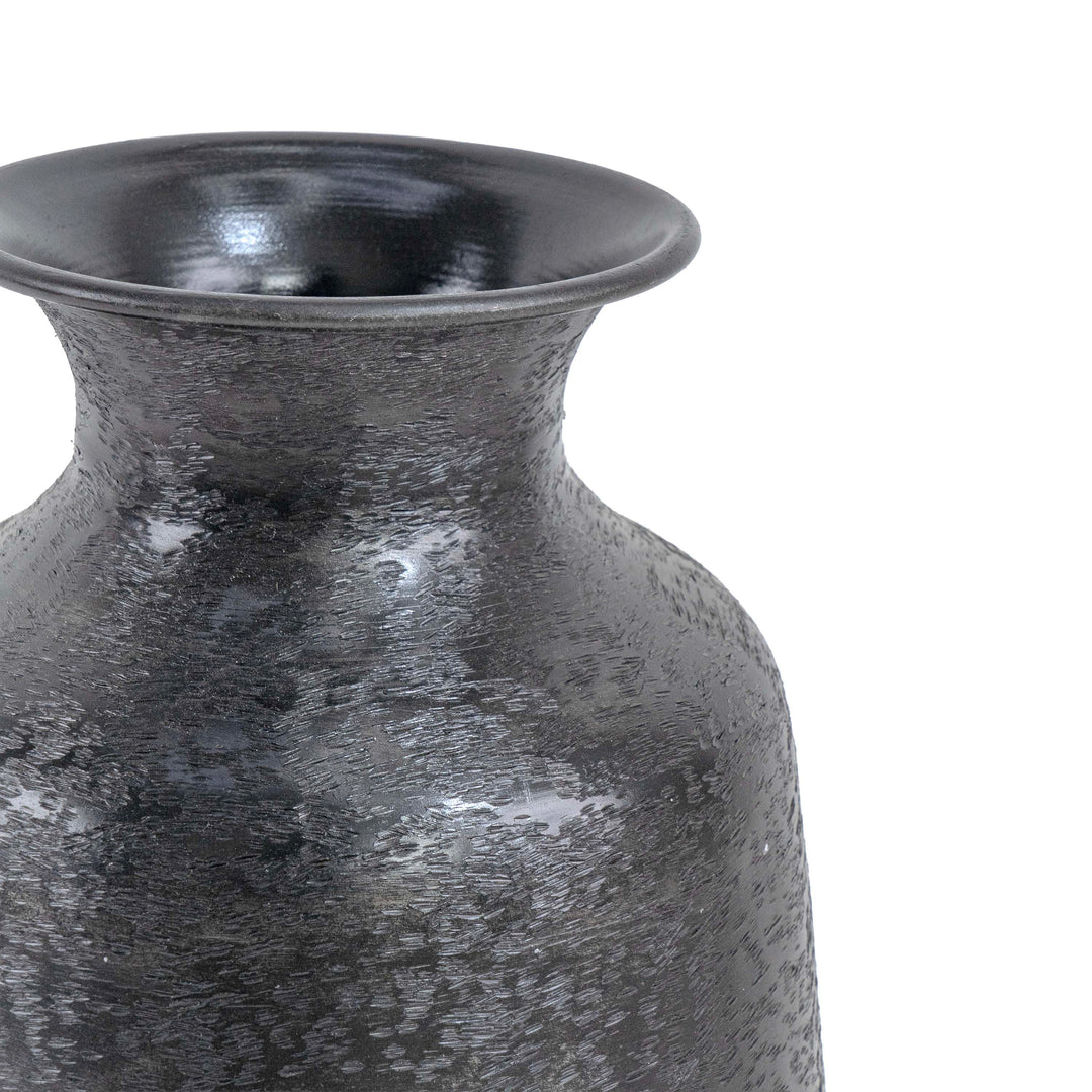 Tall metal vase with small mouth