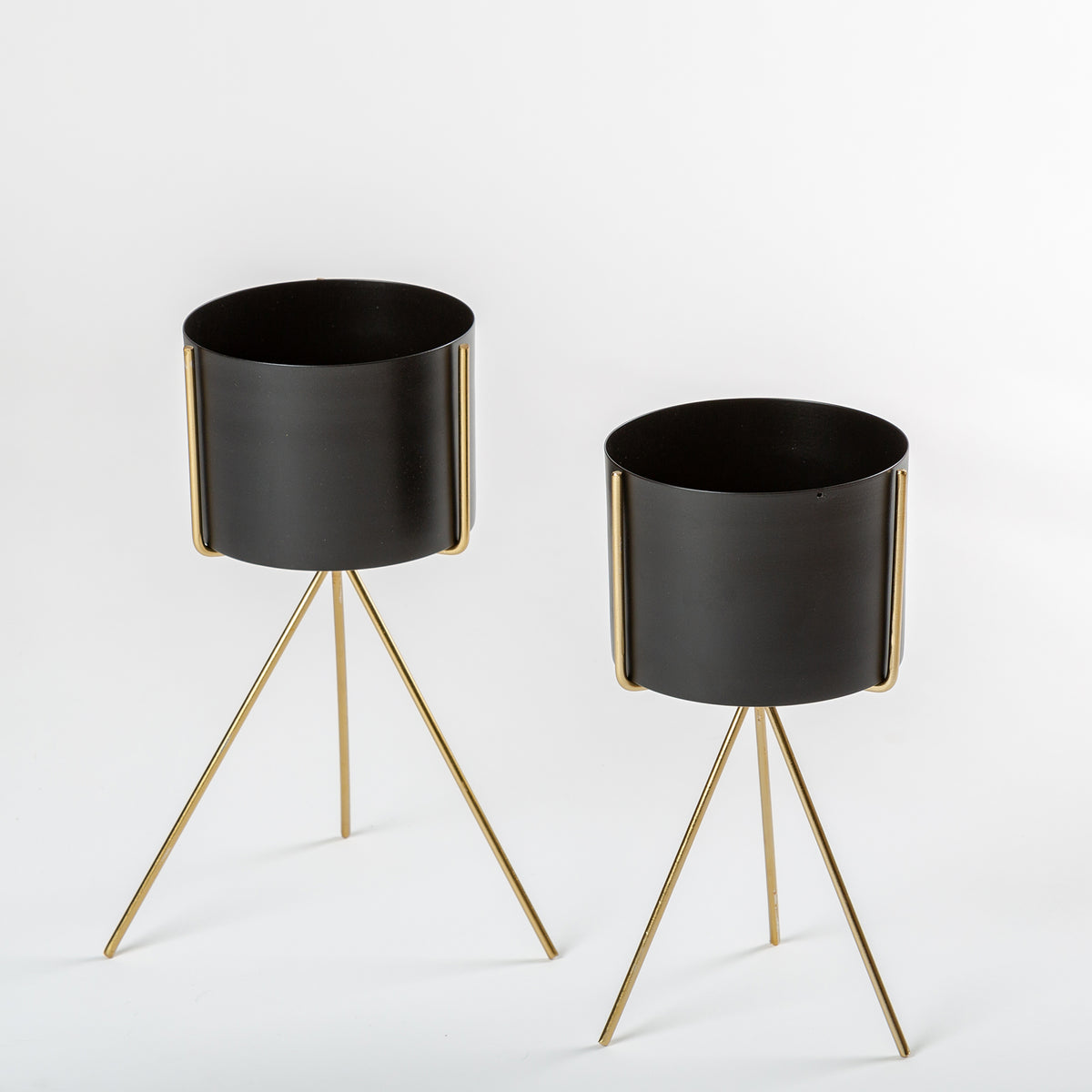 Black planter with golden stand